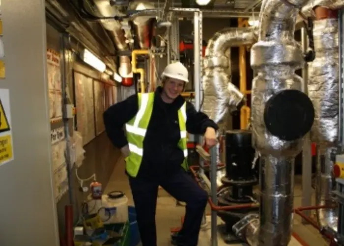 Person standing in plant room