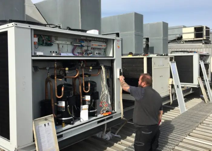 Person working on Chiller unit